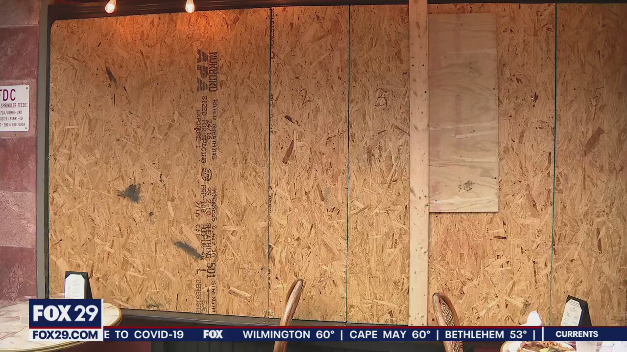 Businesses board up fearful of looting, vandalism