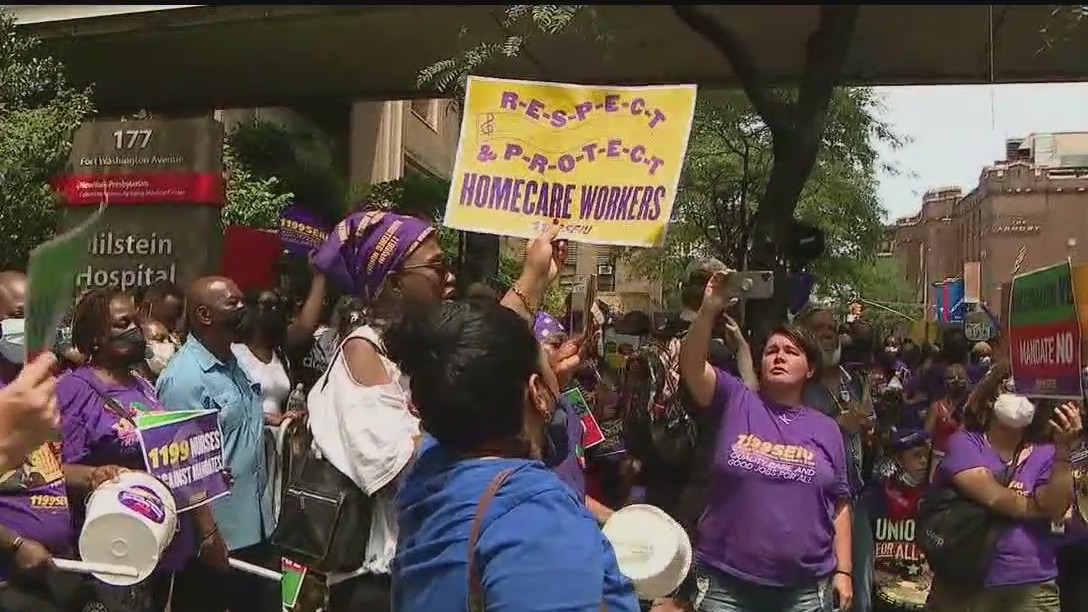 Hospital workers rally against vaccine mandate
