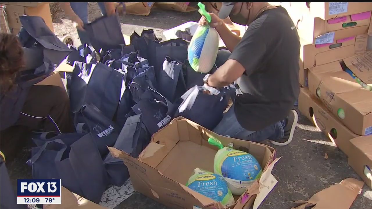 Law firm gives away hundreds of turkeys