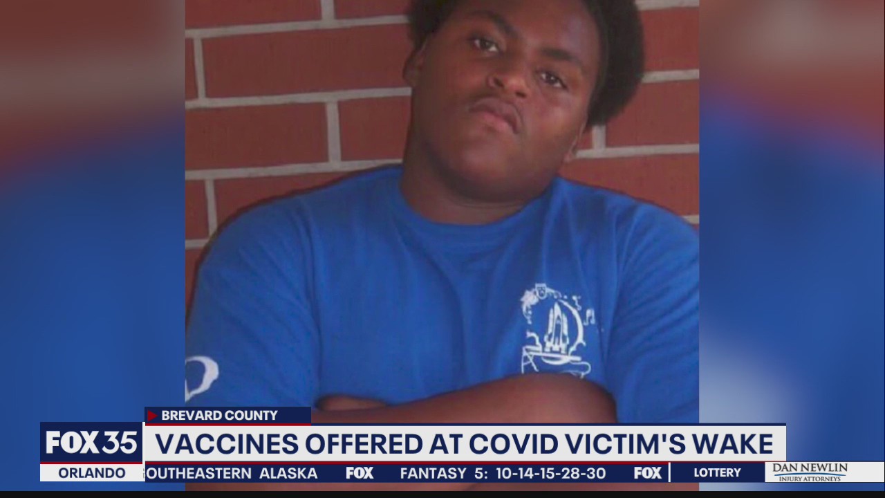 Vaccines offered at COVID victim's wake