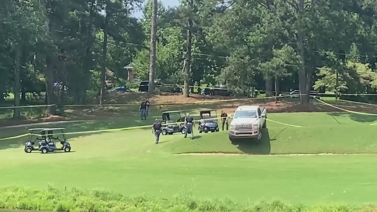 Resident pay respects at golf course where 3 were found dead