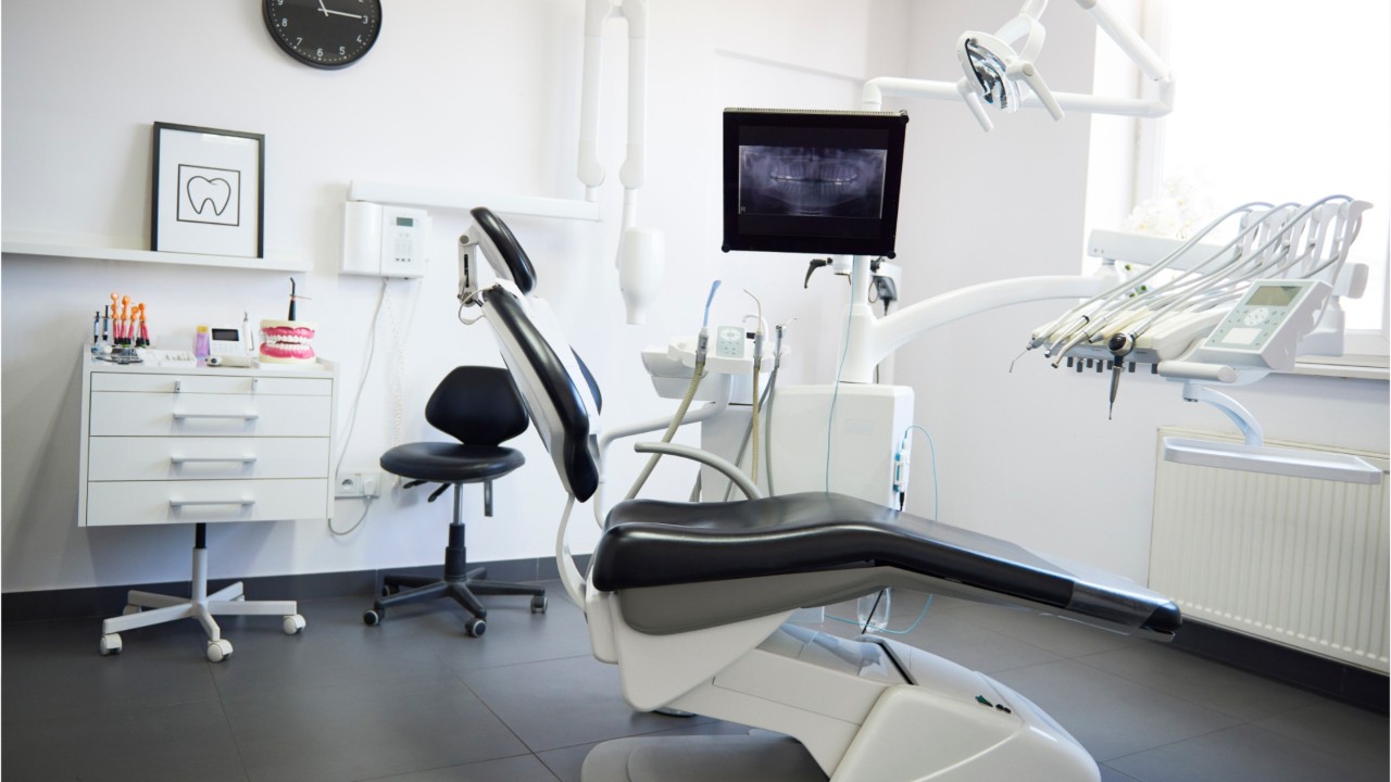 Dental hygienist says he lost licence for treating wife