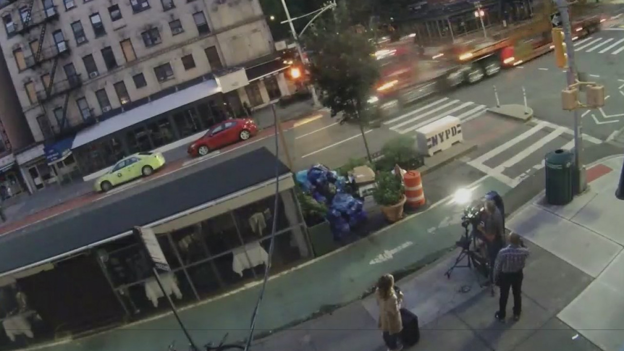 Flying debris nearly hits reporter
