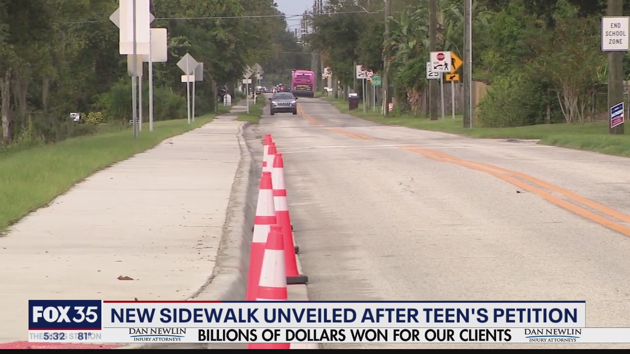 New sidewalk unveiled after teen's petition