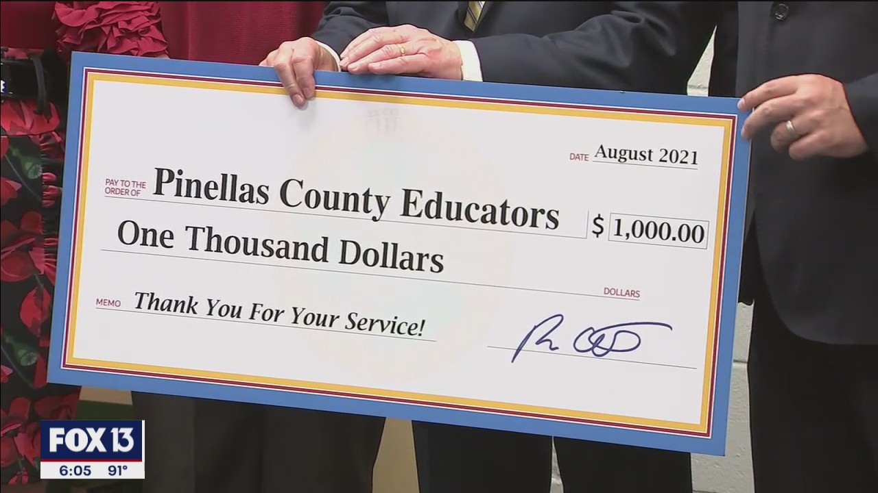 DeSantis delivers checks to educators