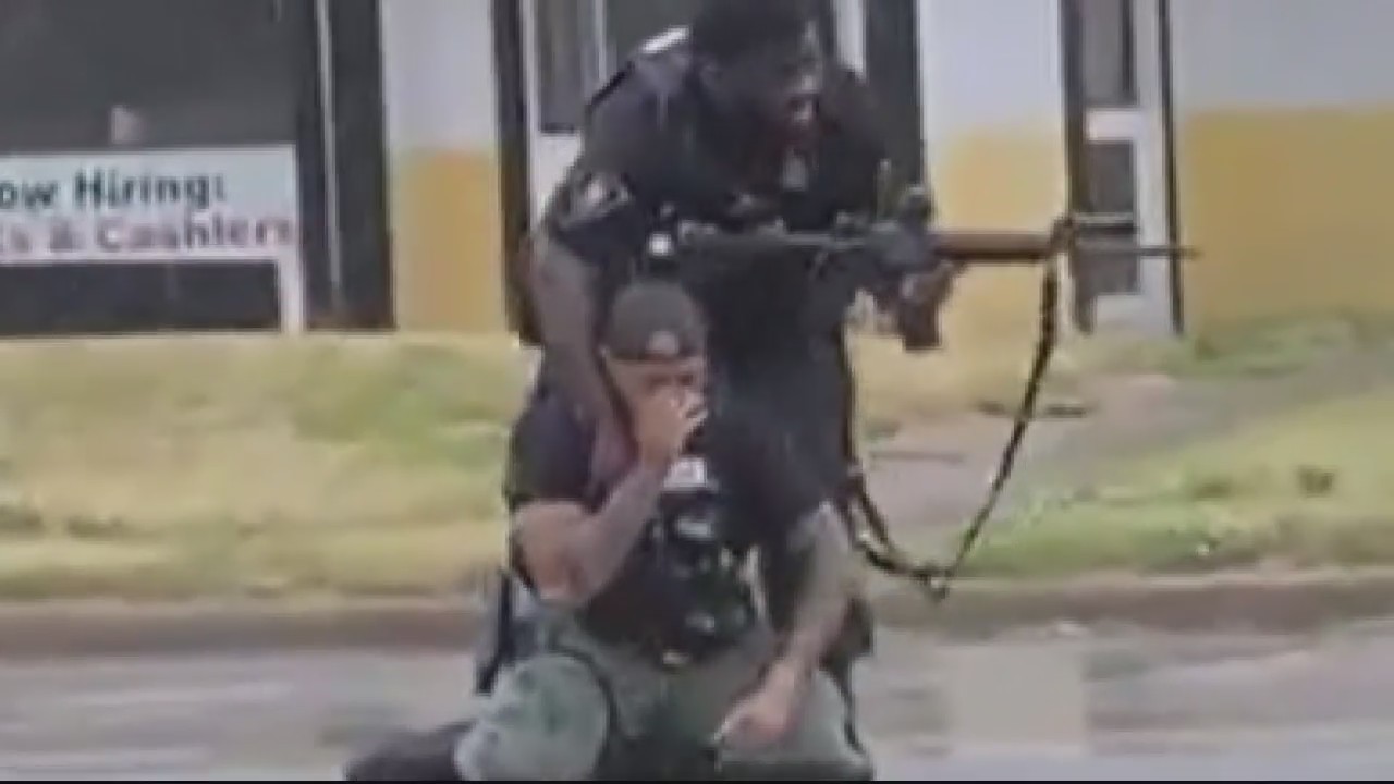 Witness sides with Flint police officer after fatal shooting of woman who had fired at cops
