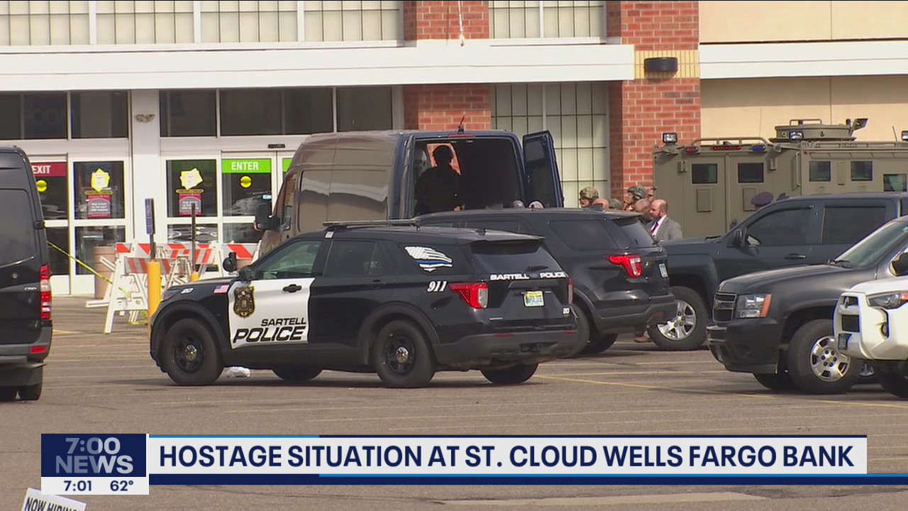 Police say 1 hostage has been released after St. Cloud bank robbery