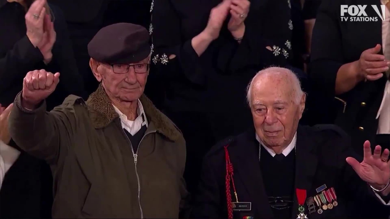 Trump honors D-Day vets, Buzz Aldrin in SOTU