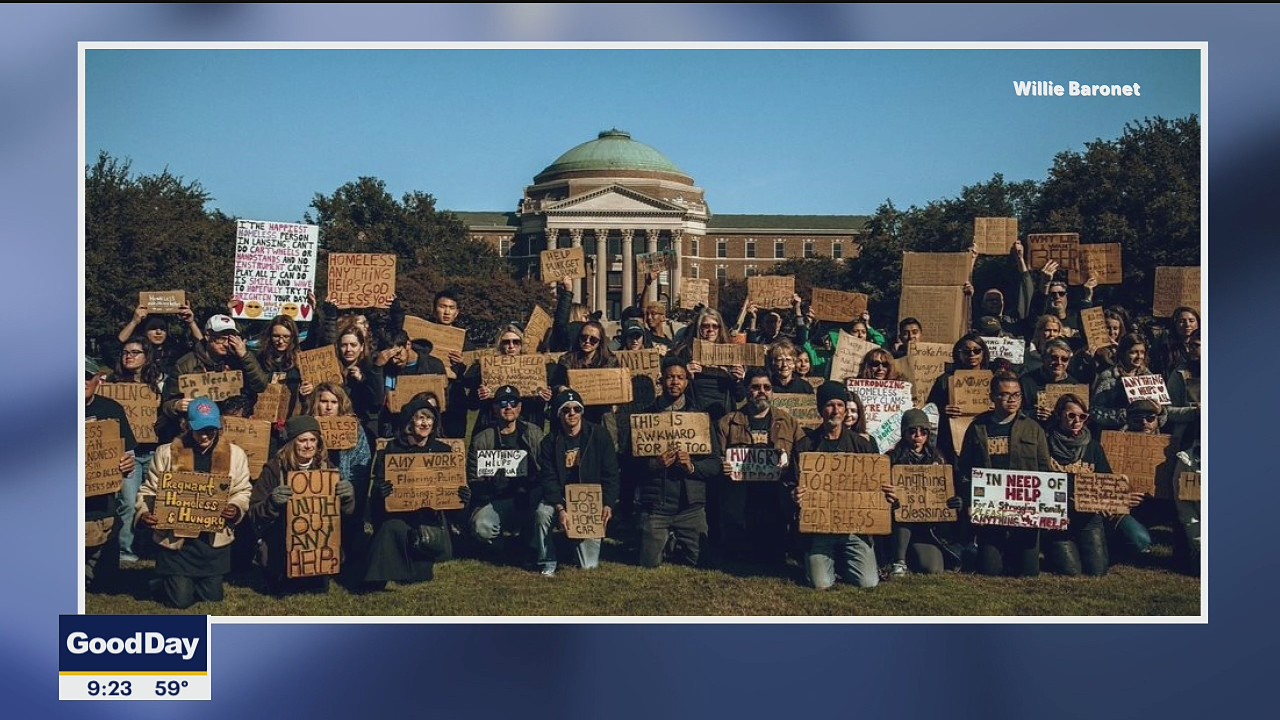 SMU professor buys signs from the homeless to help raise awareness