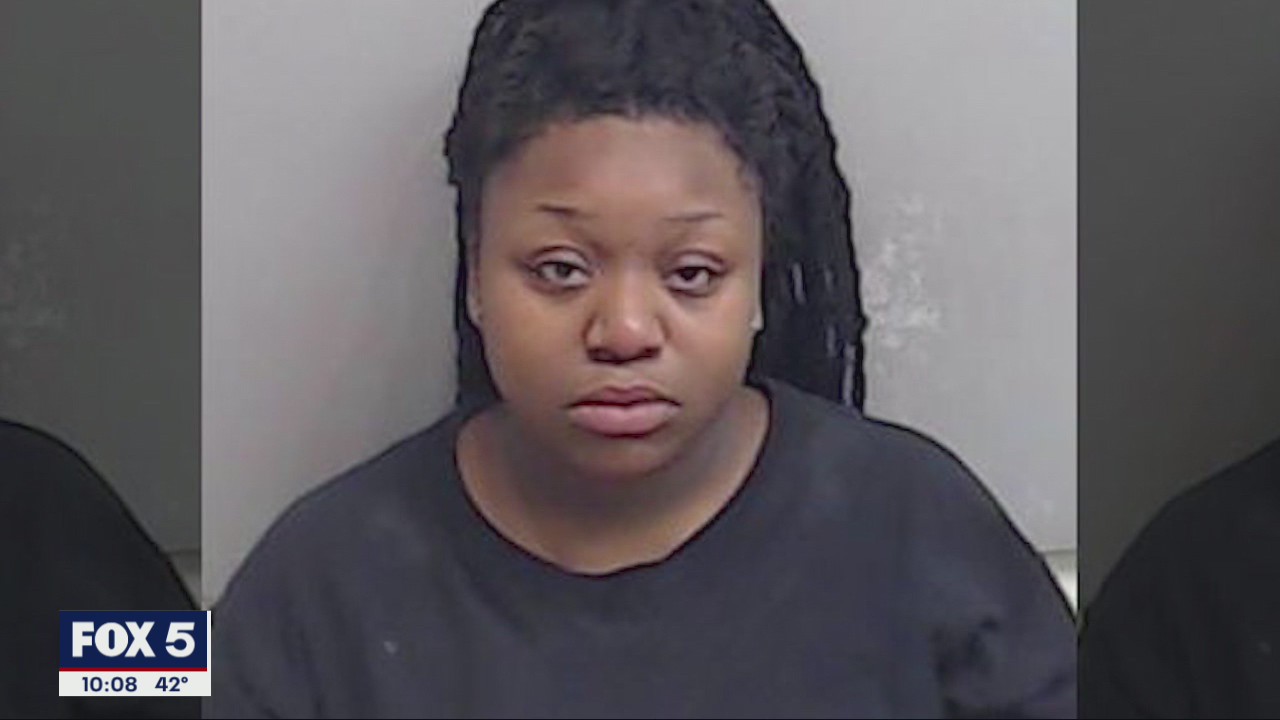Woman accused of hitting co-worker