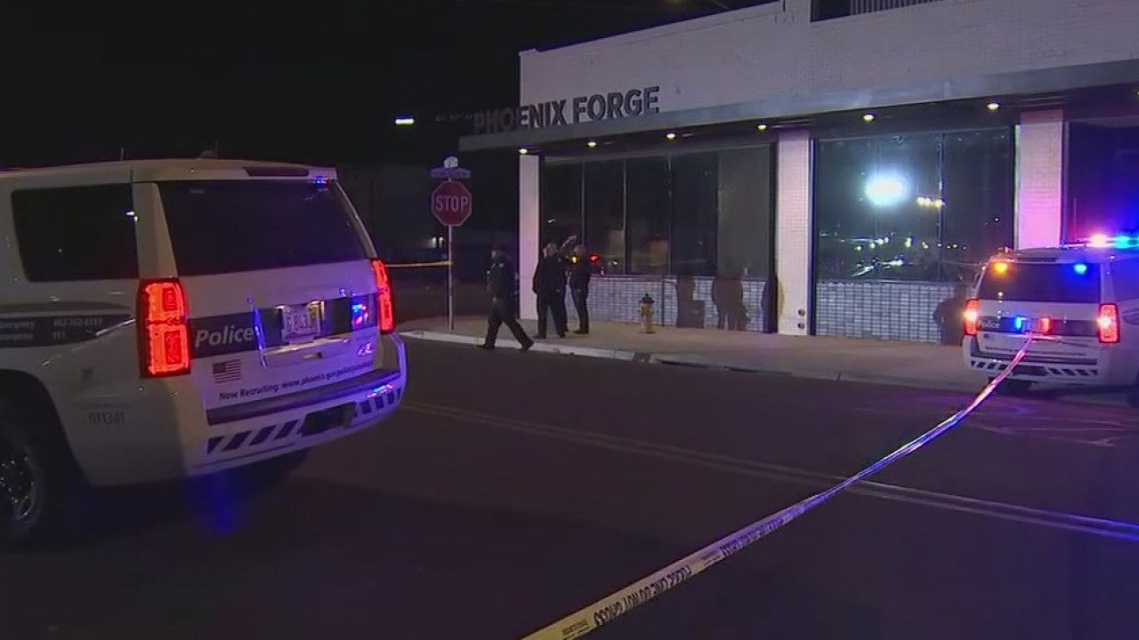 Man holding a baby, firing a gun, shot by Phoenix Police