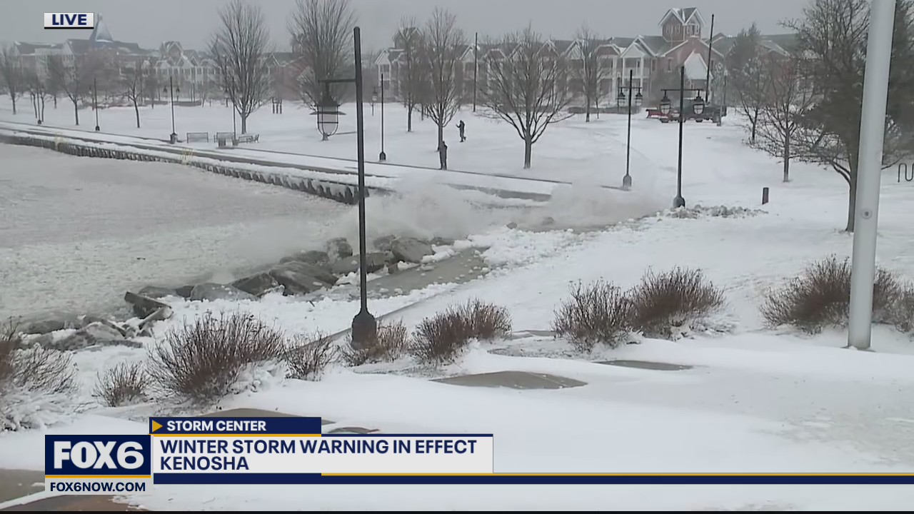 Moderate to heavy snow ongoing, wind gusts lead to blowing, drifting snow