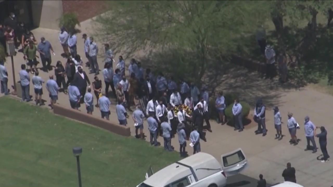 Family, coworkers bid farewell to Phoenix postmaster following COVID-related death