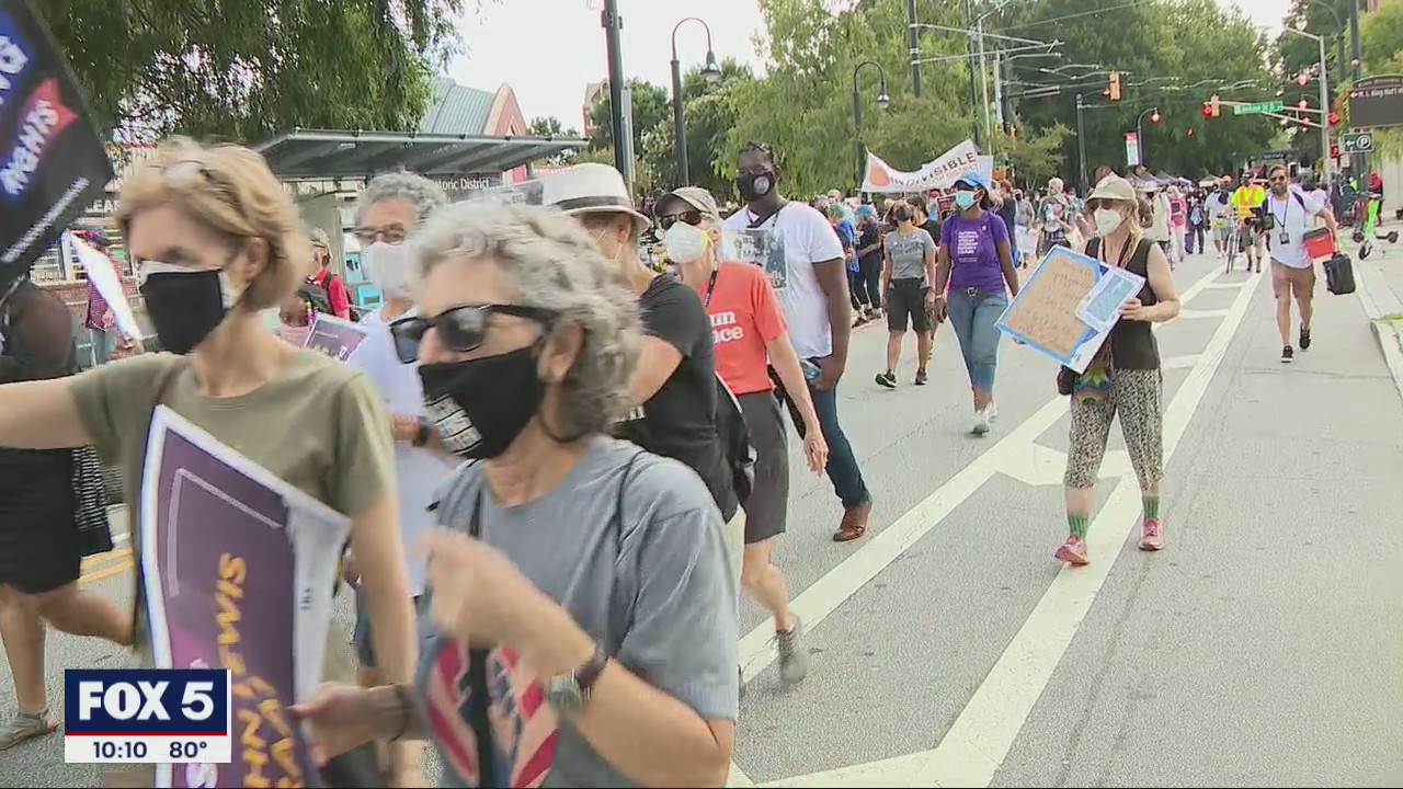 Atlanta protesters rally in solidarity with voting rights march