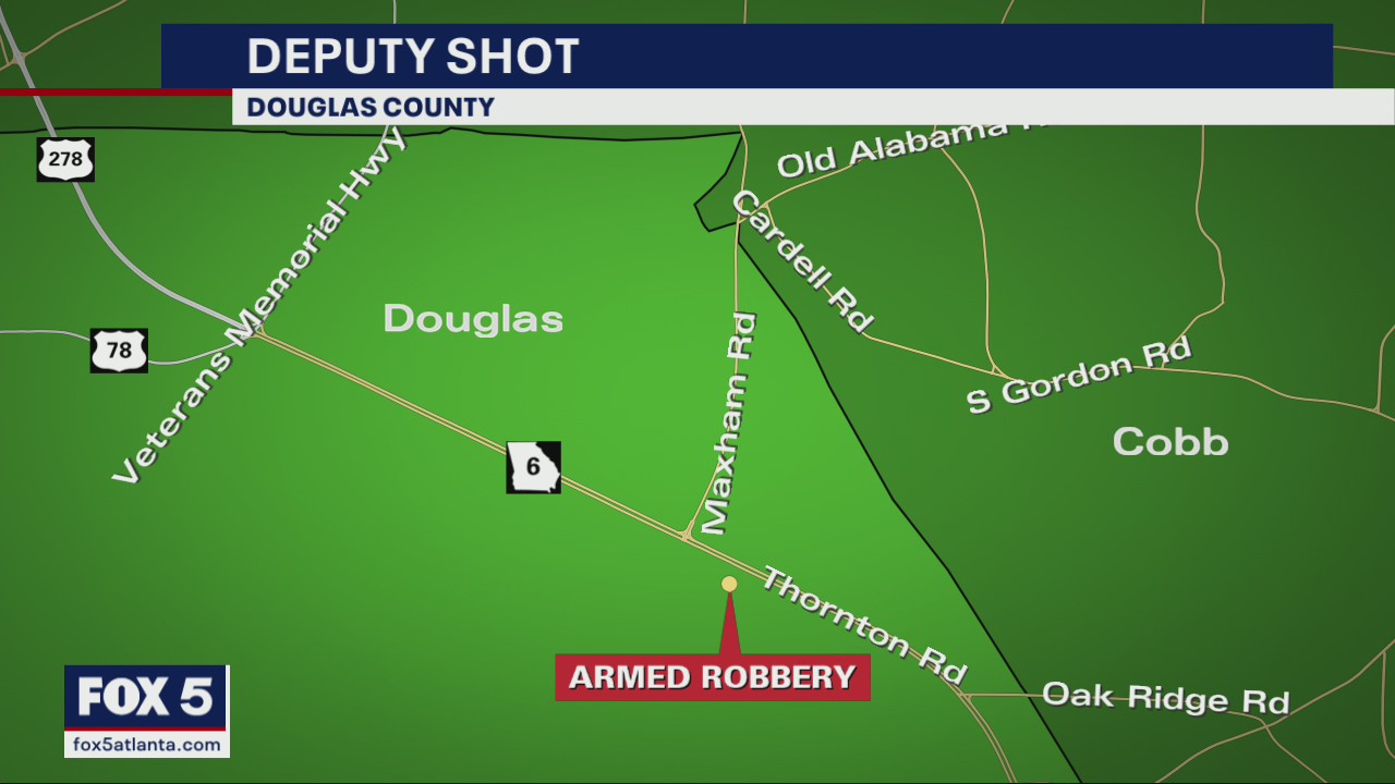 Suspect killed, deputy shot, GBI says