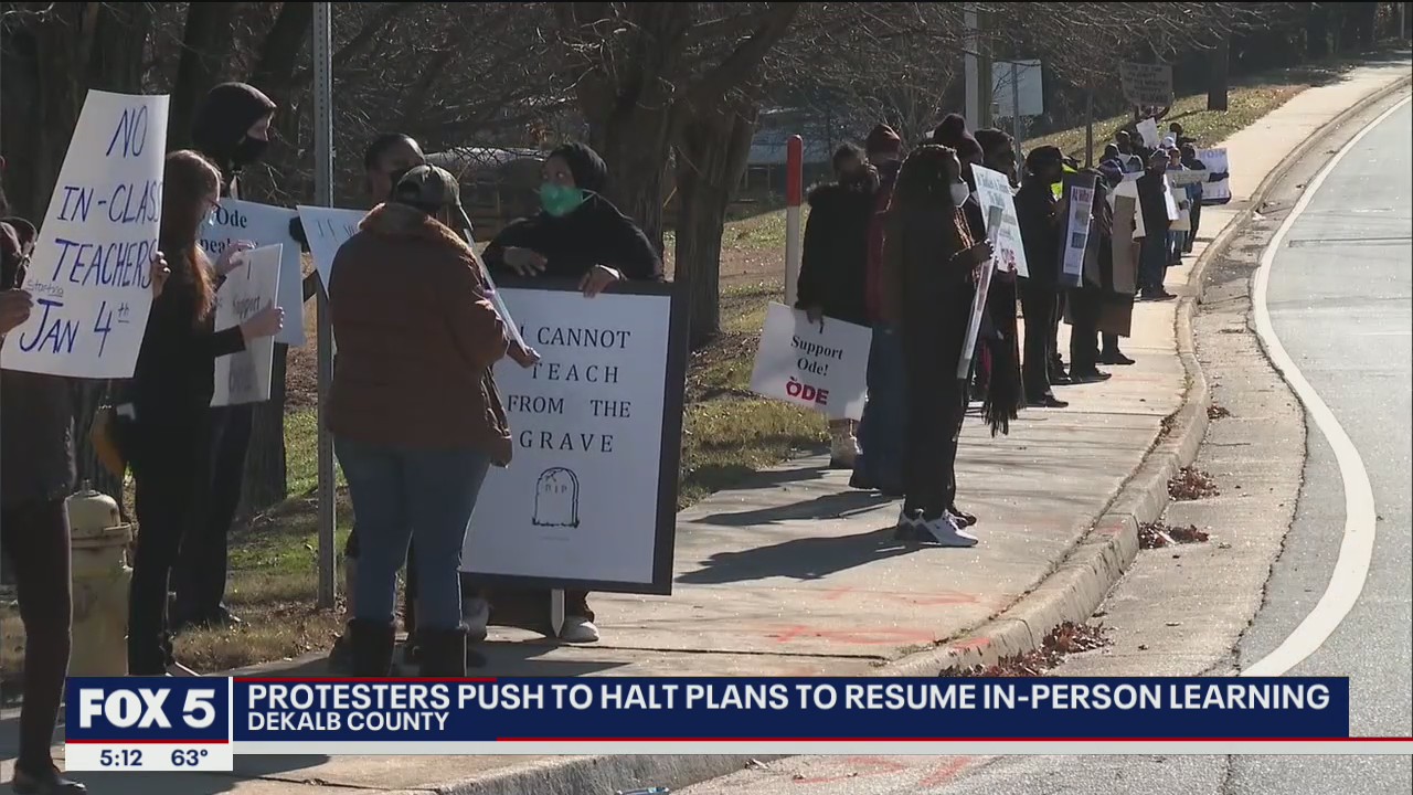 Protesters push to halt plans to resume in-person learning