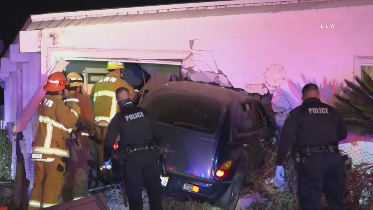 Woman killed after car slams into Pomona home