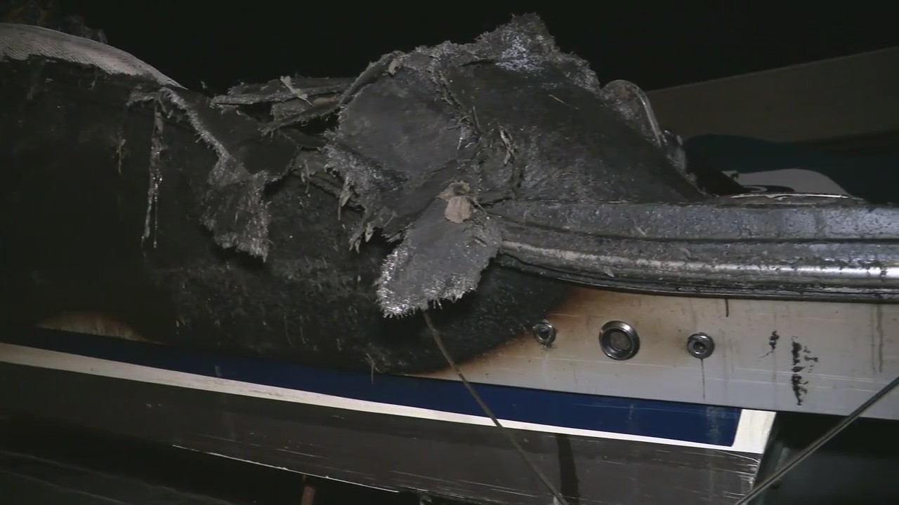 One of the flaming boats in St. Clair Shores belongs to Kirk Gibson