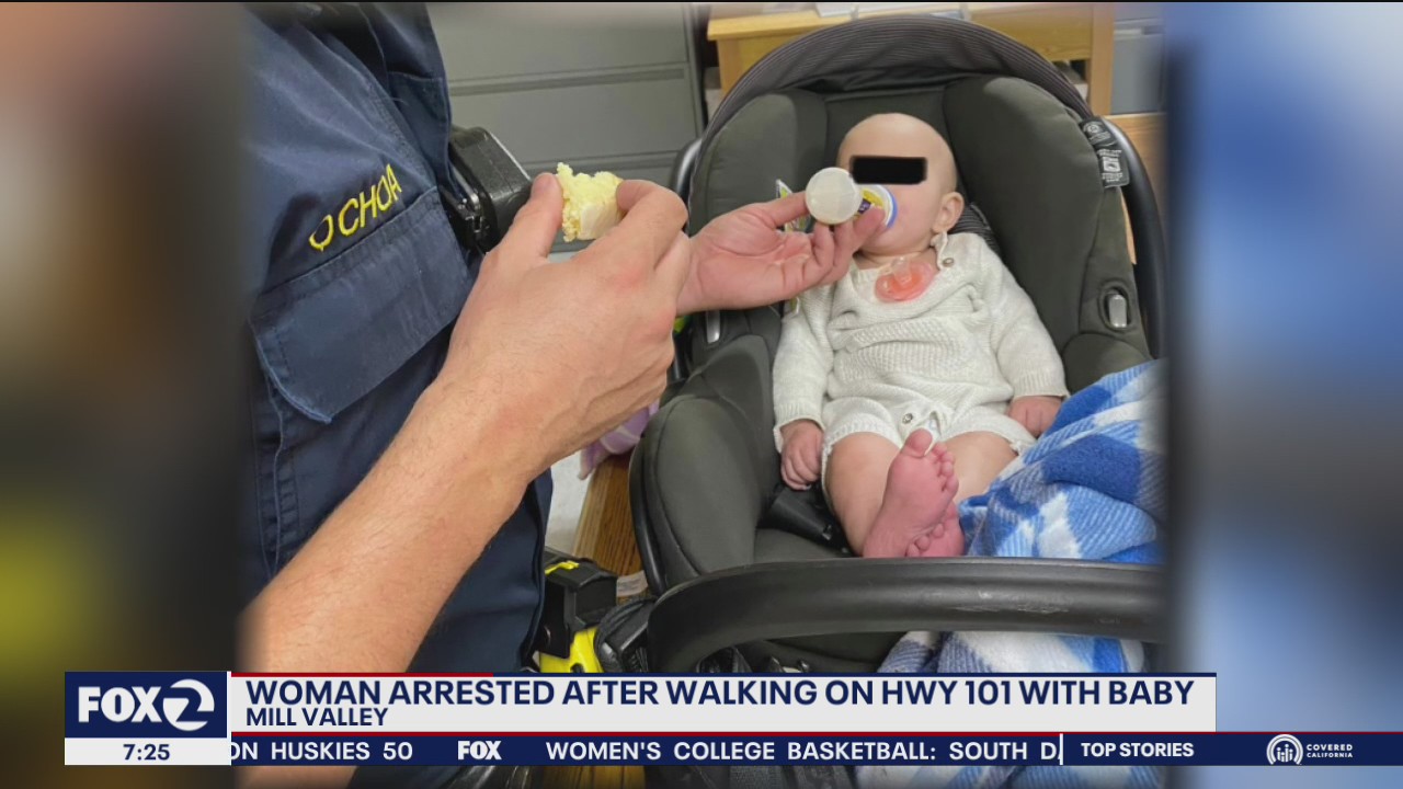 Woman arrested after walking down highway with baby