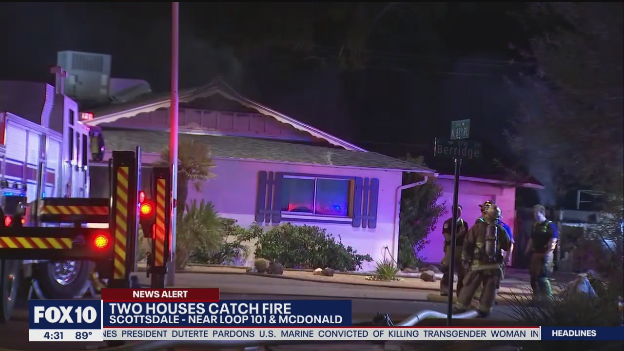 Firefighters battle double house fire in Scottsdale