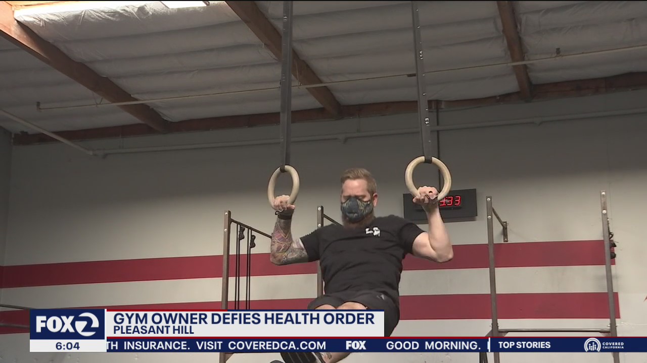 Gym owner defies health order