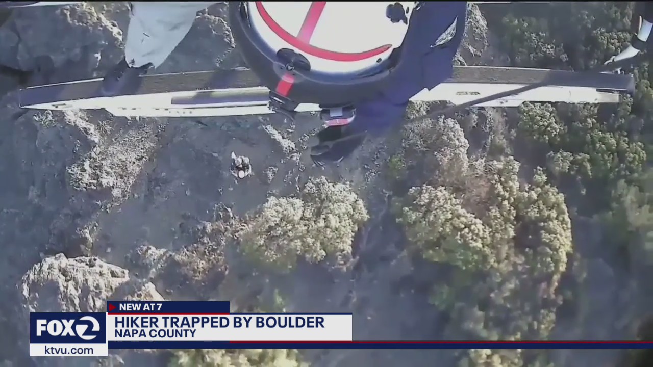 Police rescue hiker trapped by falling boulder