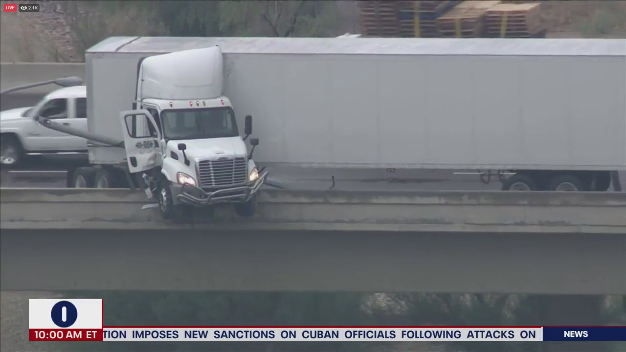 A jackknifed semi-truck is hanging over a freeway in Phoenix | LiveNOW from FOX
