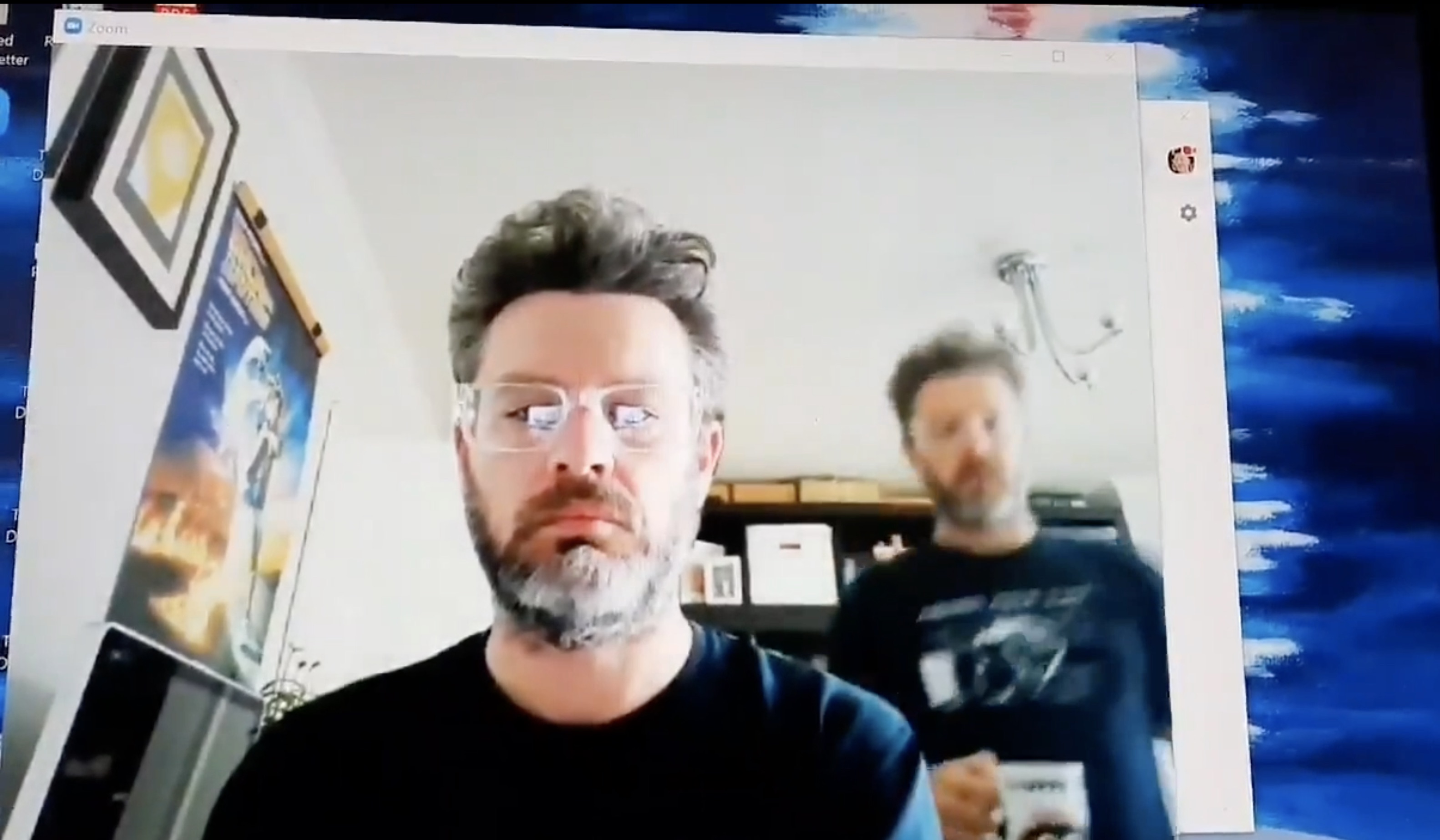Man brings himself tea in Zoom background