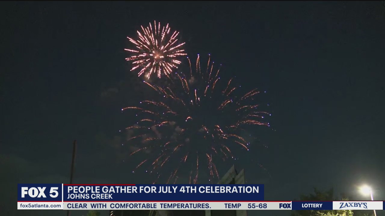 People gather for in-person fireworks shows