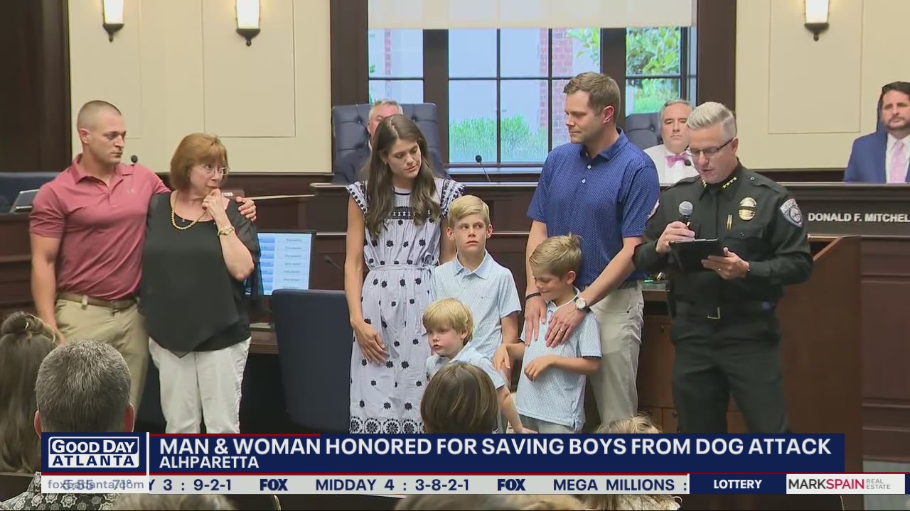 Alpharetta man and woman honored for saving boys from dog attack