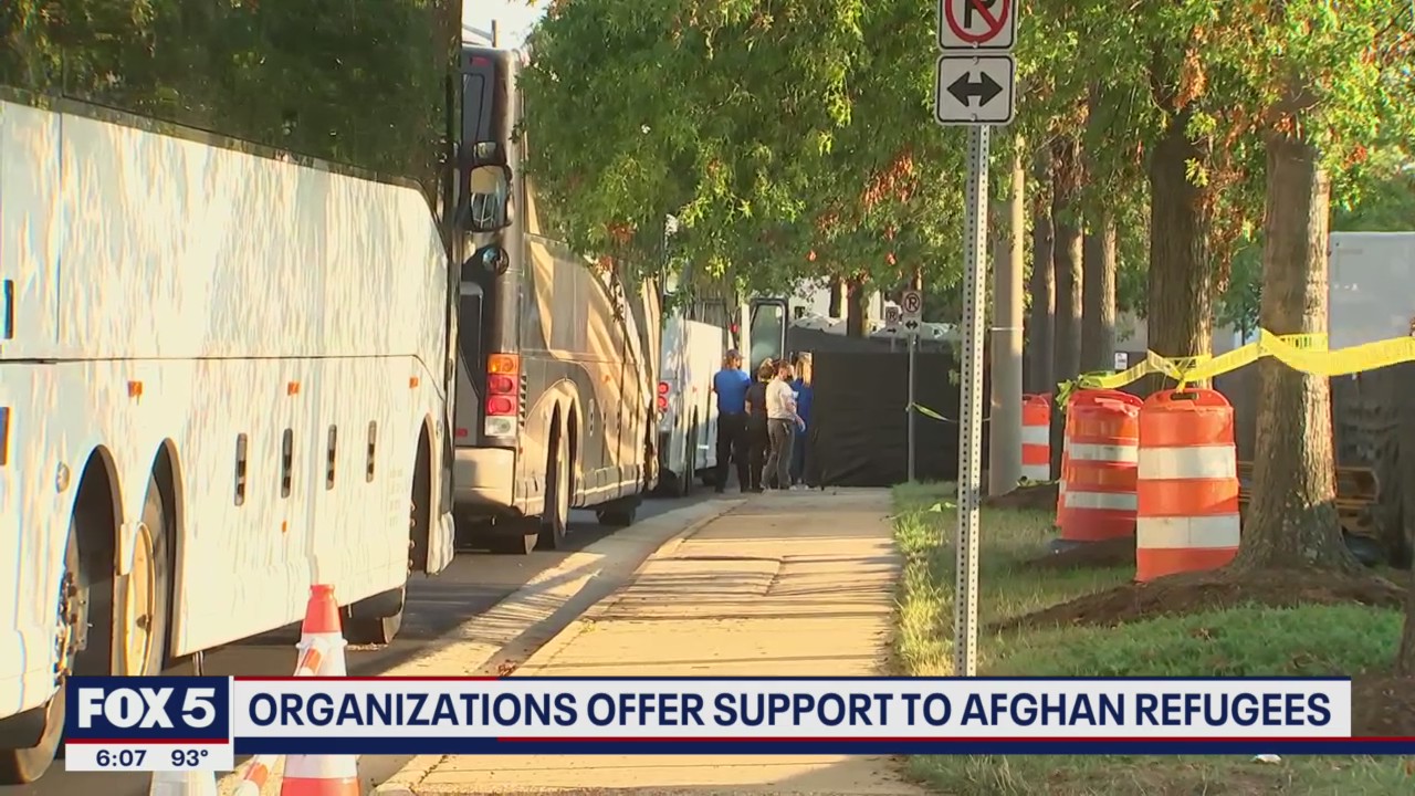 Afghan refugees fleeing Taliban land at Dulles International