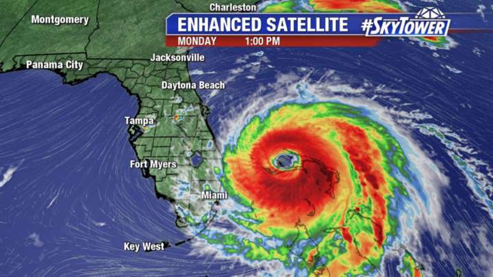 Hurricane Dorian, now Category 2 storm, crawls along after parking over Bahamas