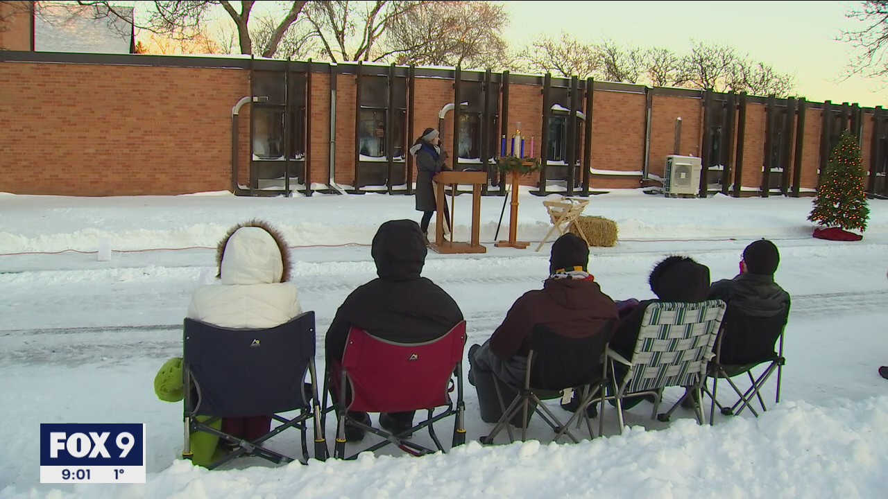 Parishioners brave frigid cold for outdoor Christmas Eve service in Roseville, Minn.