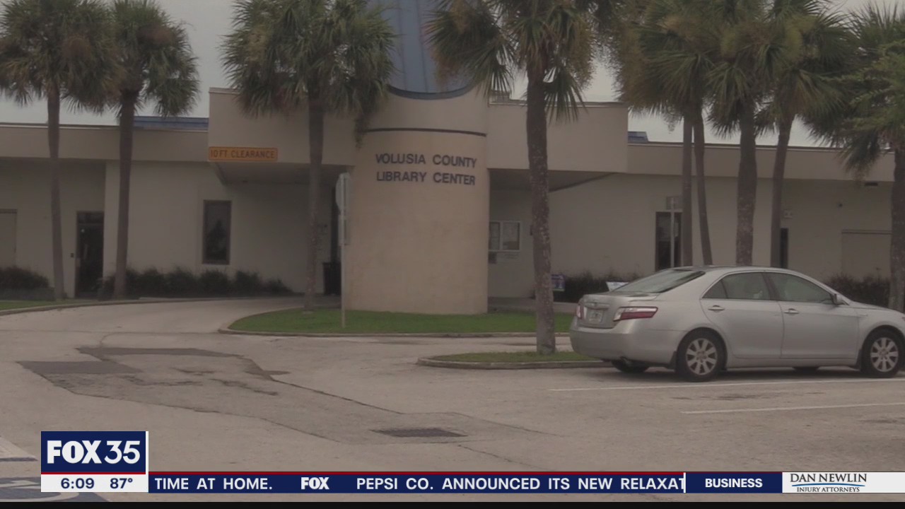 Police say man attacked librarian with scissors