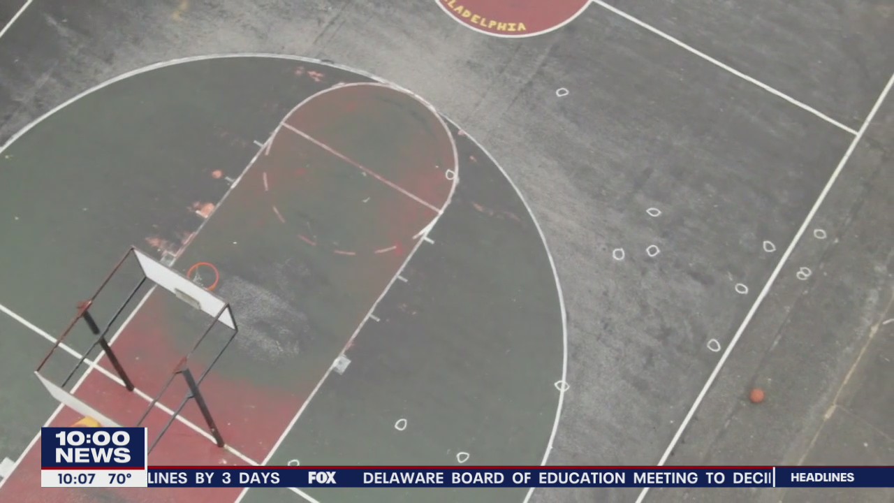 Police identify 2 killed in basketball court shooting that injured 3 others