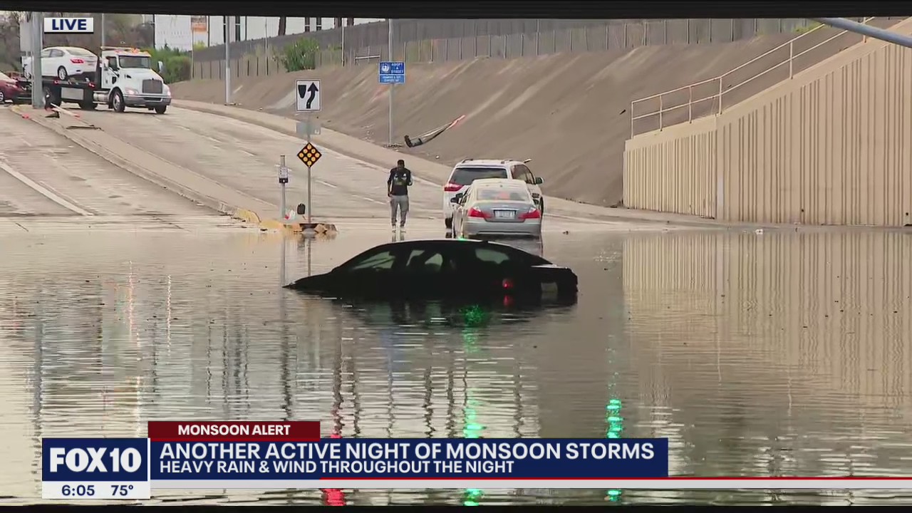 Cars stuck in flooding at I-17, Greenway