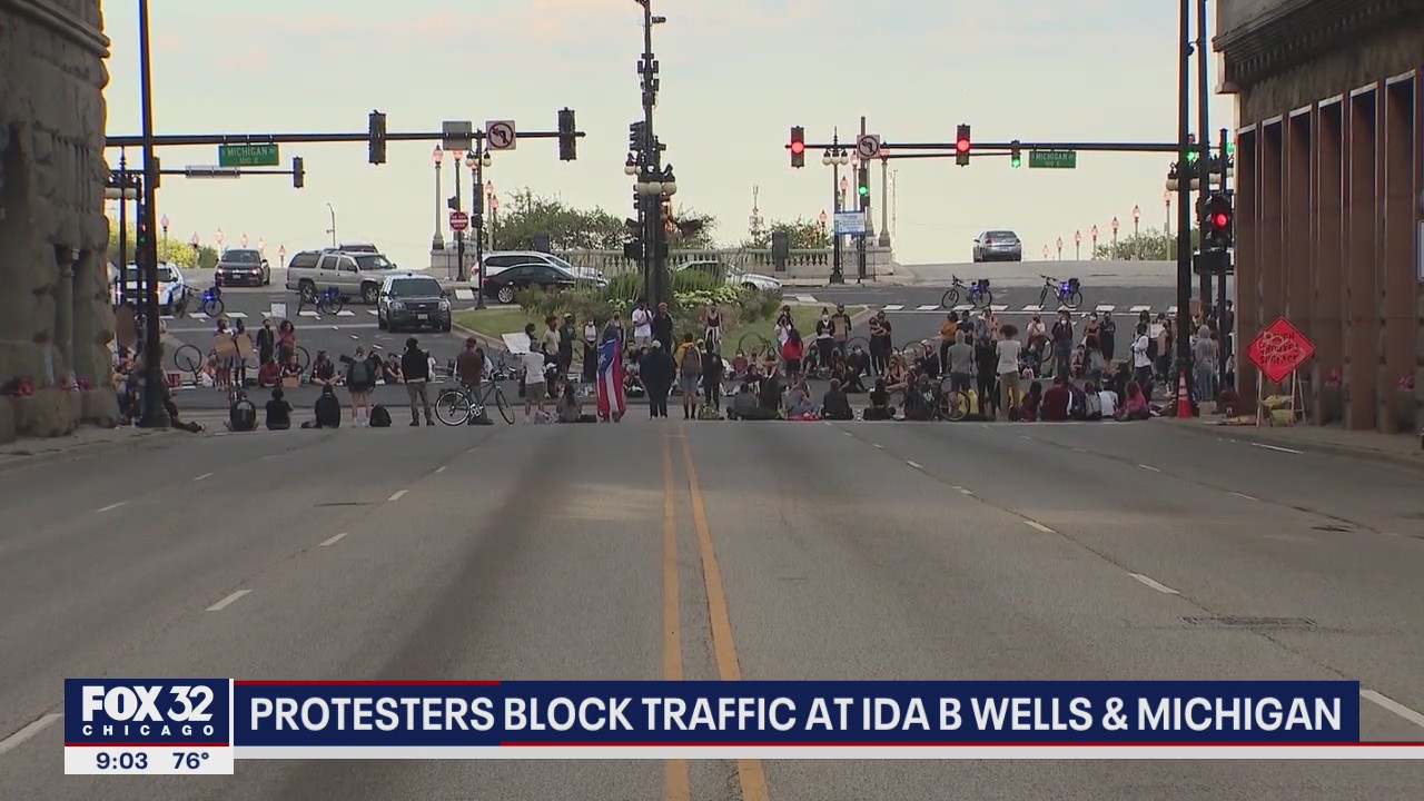 Protesters block traffic in downtown Chicago to raise awareness about violence against Black women