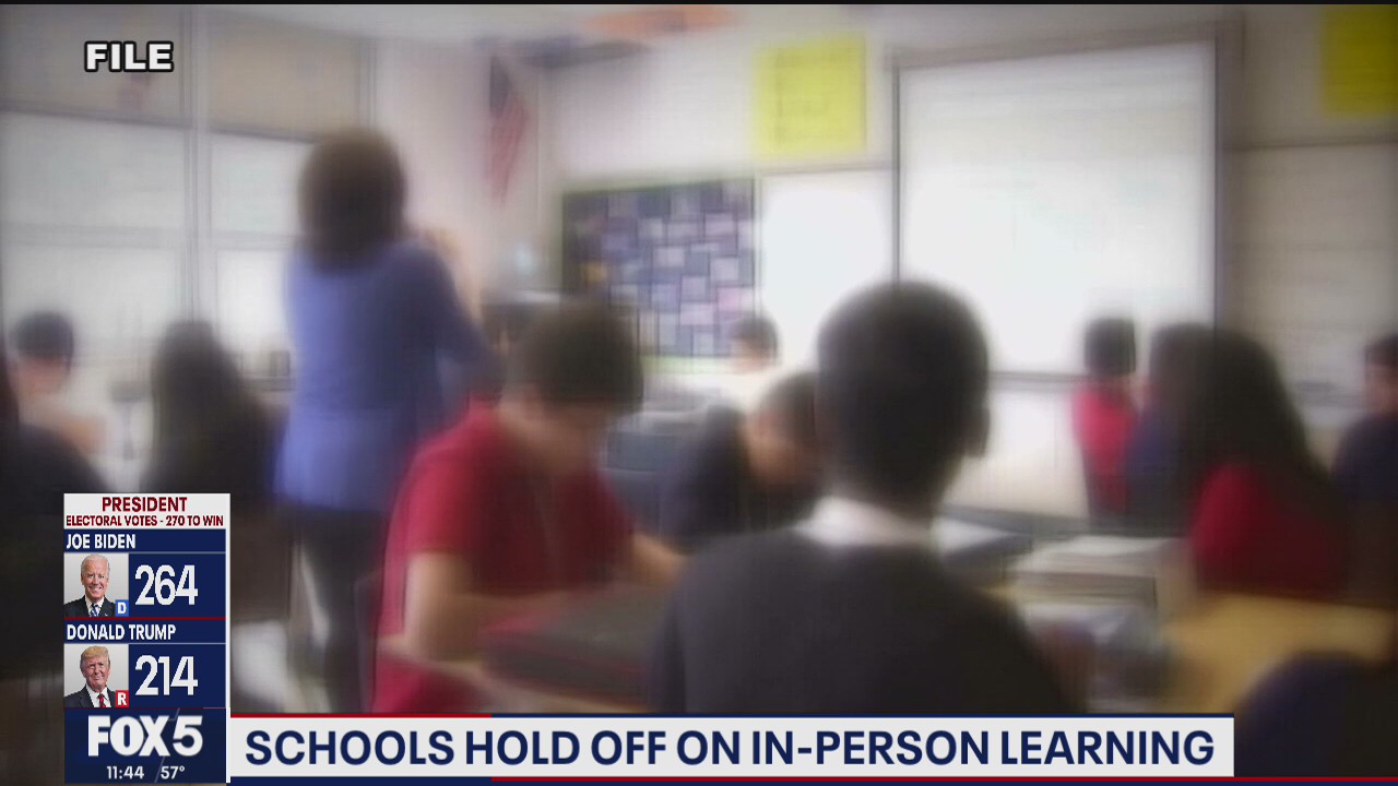 Schools hold off on in-person learning