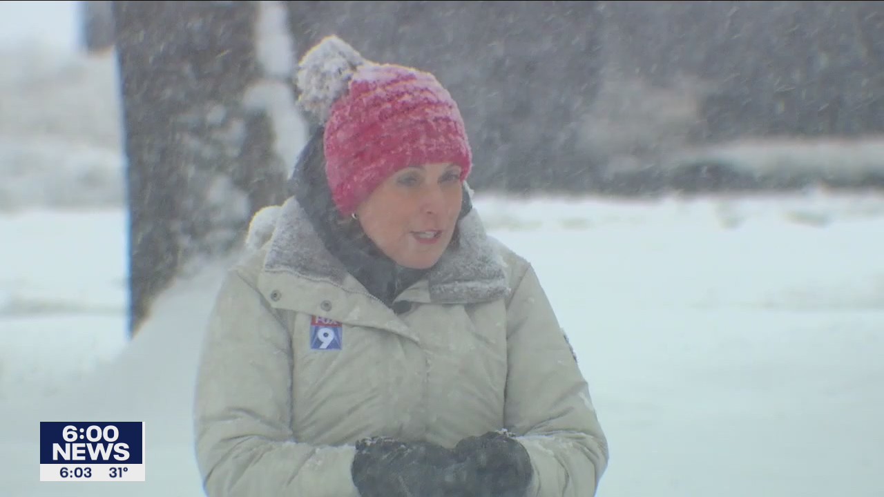 FOX 9 Reporter Karen Scullin not thrilled to see snow in October