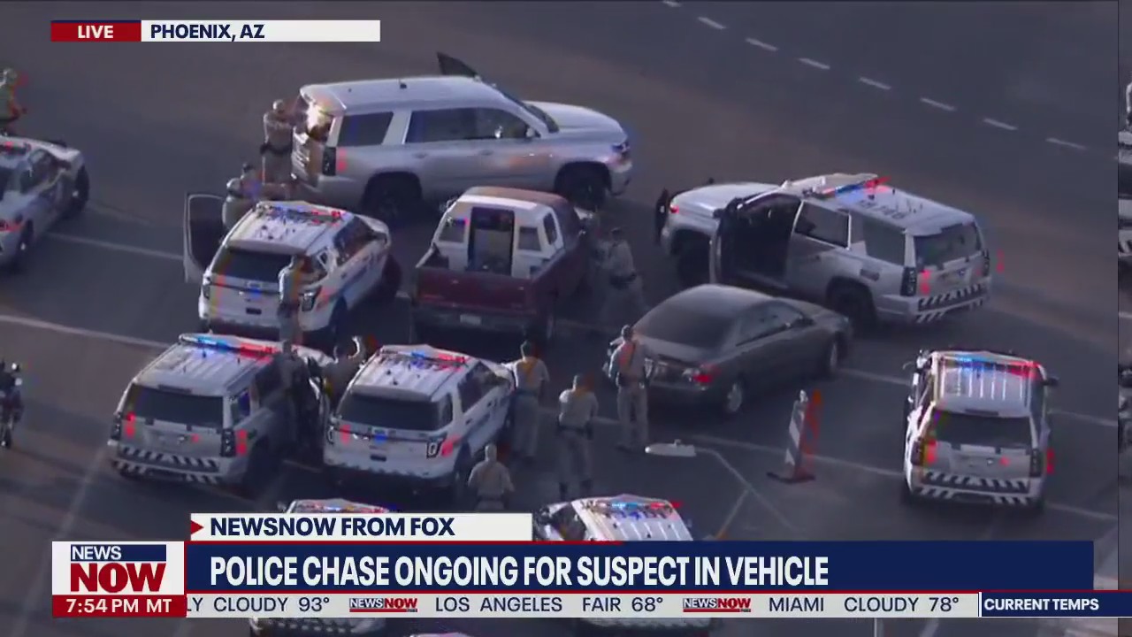 Watch Phoenix police surround this driver with guns drawn following pursuit