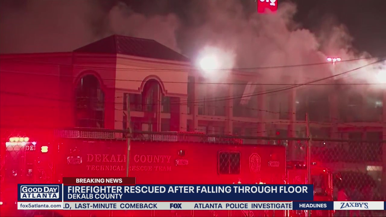 Firefighter rescued while battling hotel blaze