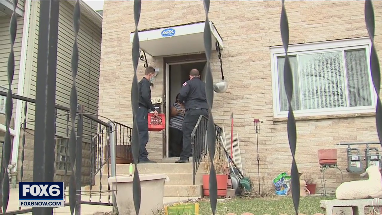 Firefighters go door-to-door, check homes for working smoke alarms