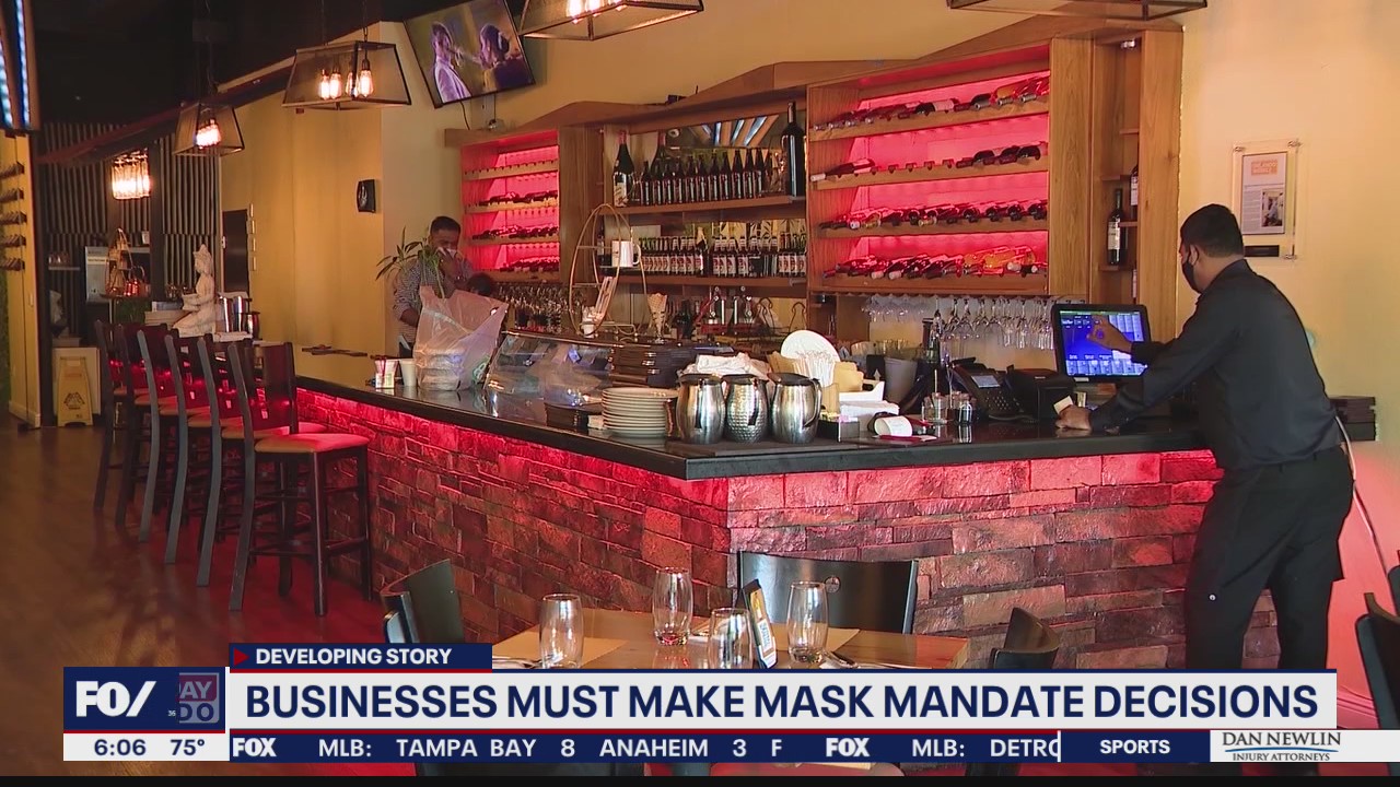 Can businesses still require masks despite lift of COVID restrictions