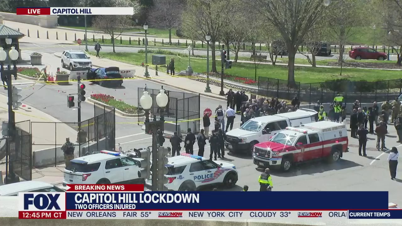 BREAKING: Two officers injured after suspect slams into barricade armed with knife
