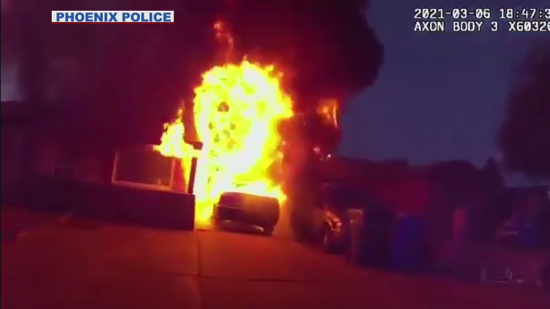 Woman, children saved from burning home by police officers