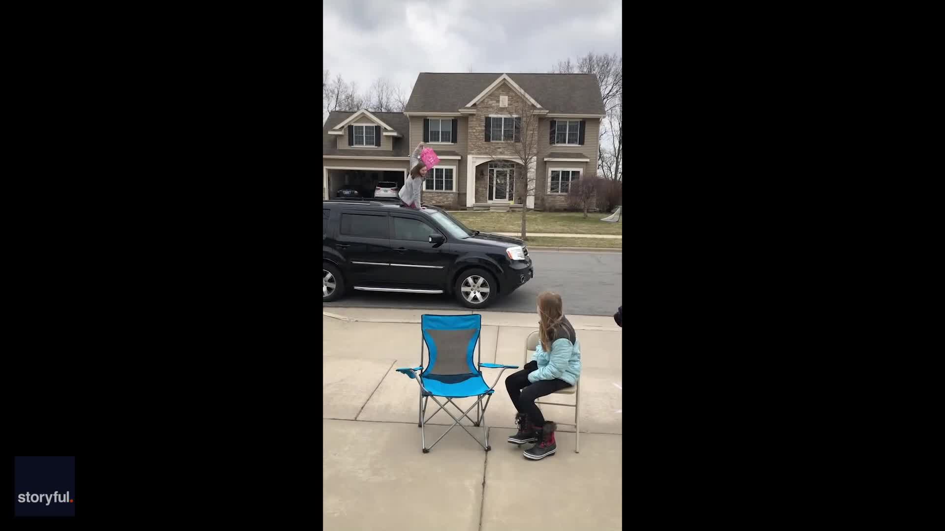 Girl gives birthday gift to friend using fishing rod amid pandemic
