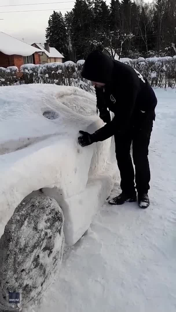 Couple creates the Ferrari LaFerrari supercar out of snow