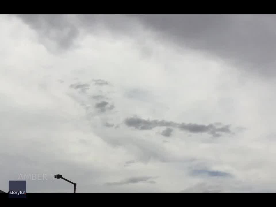 Woman spots face in clouds above Las Vegas amid flooding