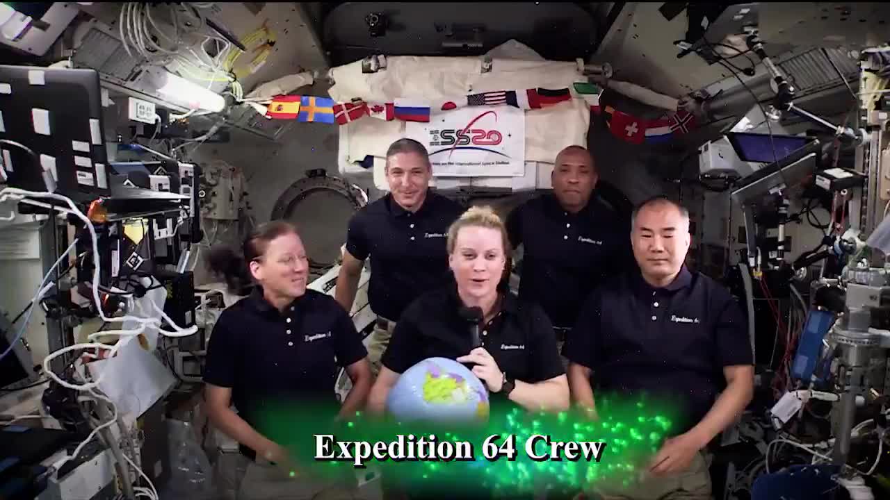 International Space Station crew celebrates 2021 with zero-gravity ball drop in space