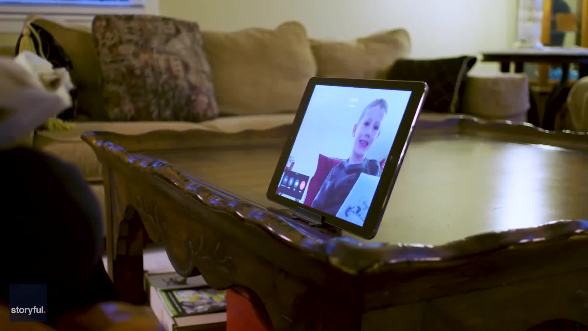 7-year-old reads bedtime story over video chat to grandmother